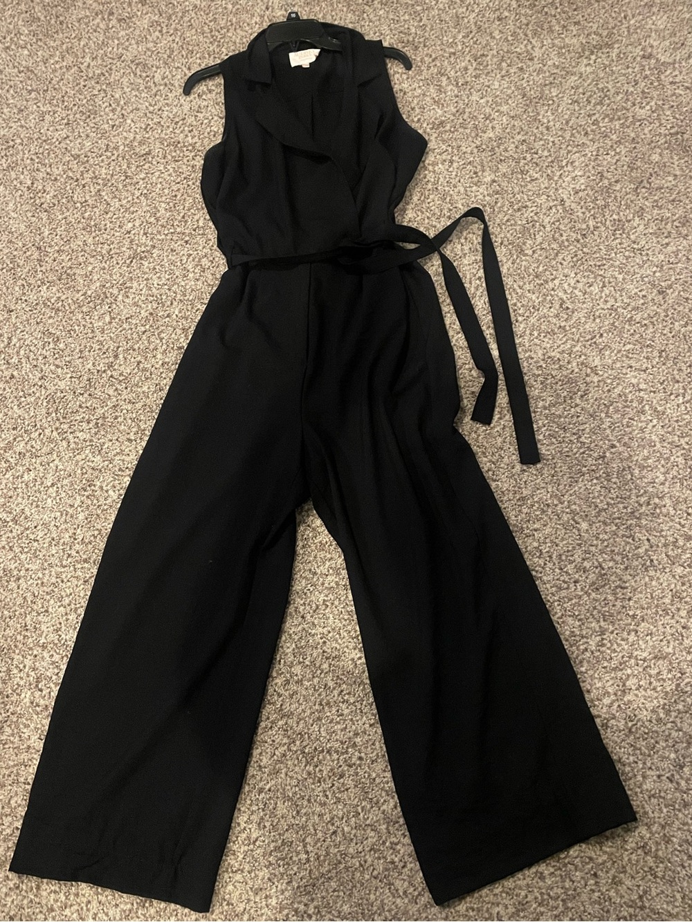 Francesca’s Sleeveless Black Wide-Leg Jumpsuit with Self-Tie Waist